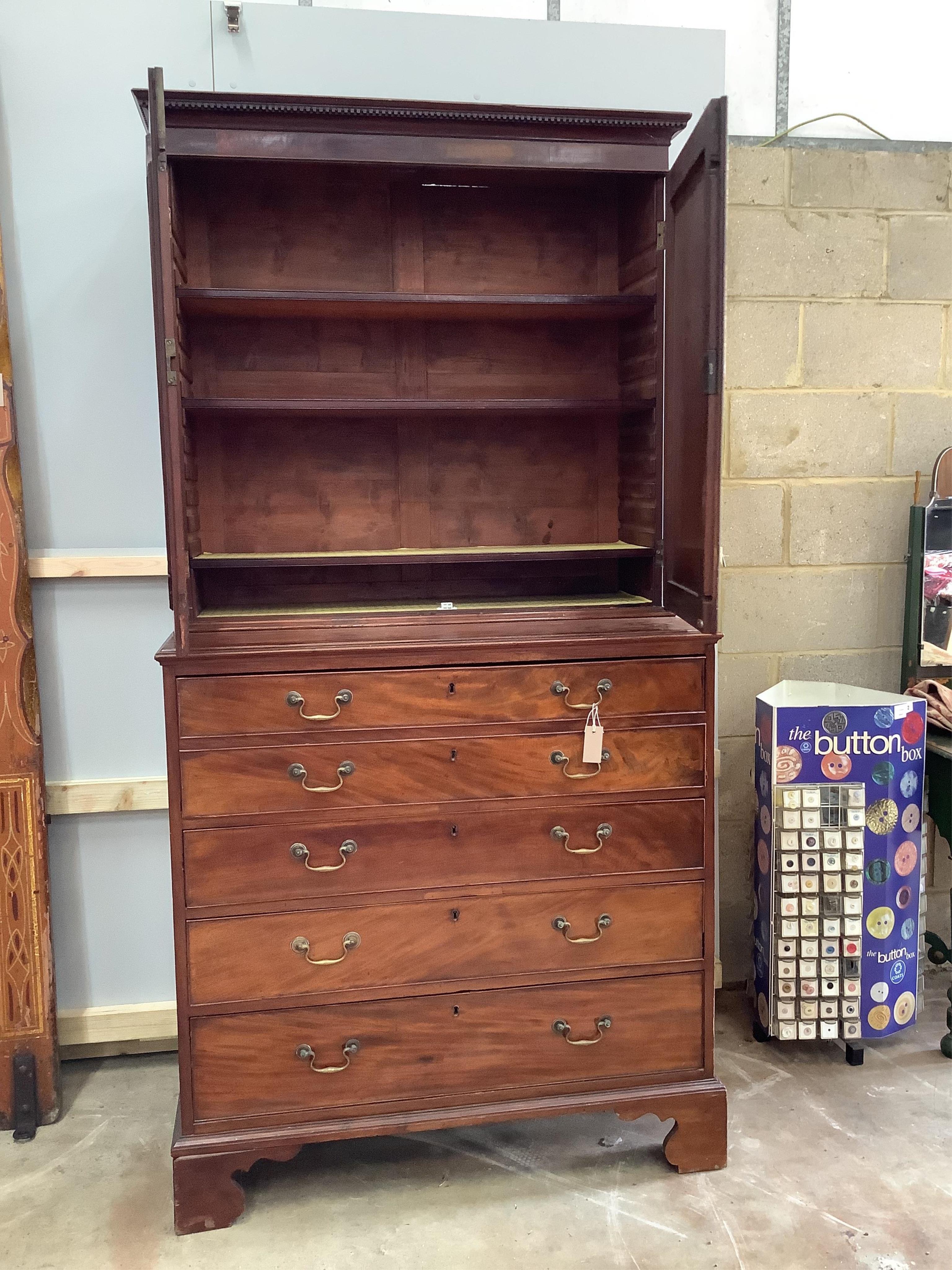 A George III mahogany secretaire cabinet, width 108cm, depth 56cm, height 213cm. Condition - fair